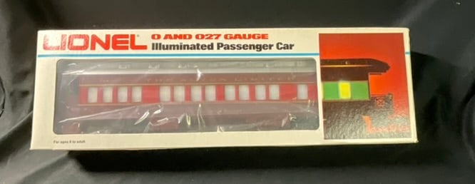 Lionel 6-9557 Chicago and Alton Webster Groves Illuminated Passenger Car: A Lionel O and O27 gauge illuminated passenger car, catalog number 6-9557. This model represents the Webster Groves car from the Chicago and Alton Railroads The Alton Limited series. The item is const