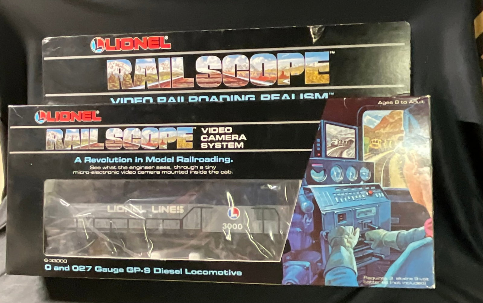 Lionel RailScope Video Camera System O Gauge GP-9 Diesel Locomotive 6-33000: Lionel RailScope Video Camera System featuring an O and O27 gauge GP-9 diesel locomotive, model number 6-33000. The locomotive is constructed with a plastic body shell, a stamped metal chassis, and me