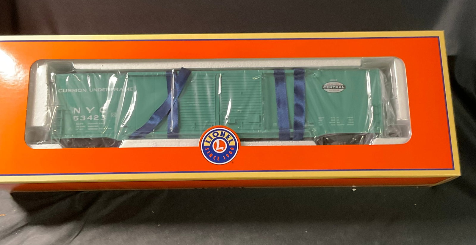 Lionel 6-27855 New York Central 60' Double Door Boxcar: This is a Lionel L.L.C. O-gauge model railroading boxcar, specifically a 60-foot double door model in New York Central livery. The piece features a jade green plastic body with white lettering and the
