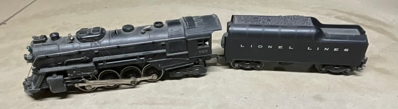 Lionel #726 Berkshire 2-8-4 Steam Locomotive and Lionel Lines Tender: A Lionel Corporation O-gauge electric #726 Berkshire 2-8-4 steam locomotive and matching Lionel Lines tender. The locomotive is constructed with a die-cast metal shell and chassis and features a three
