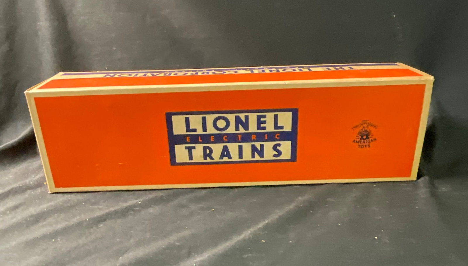 Lionel No. 3494-150 Missouri Pacific Eagle Operating Box Car with Original Box: Lionel Corporation No. 3494-150 Operating Box Car in the Missouri Pacific Lines Eagle Merchandise Service livery. The model features a molded plastic body in blue and silver with a yellow plastic slid