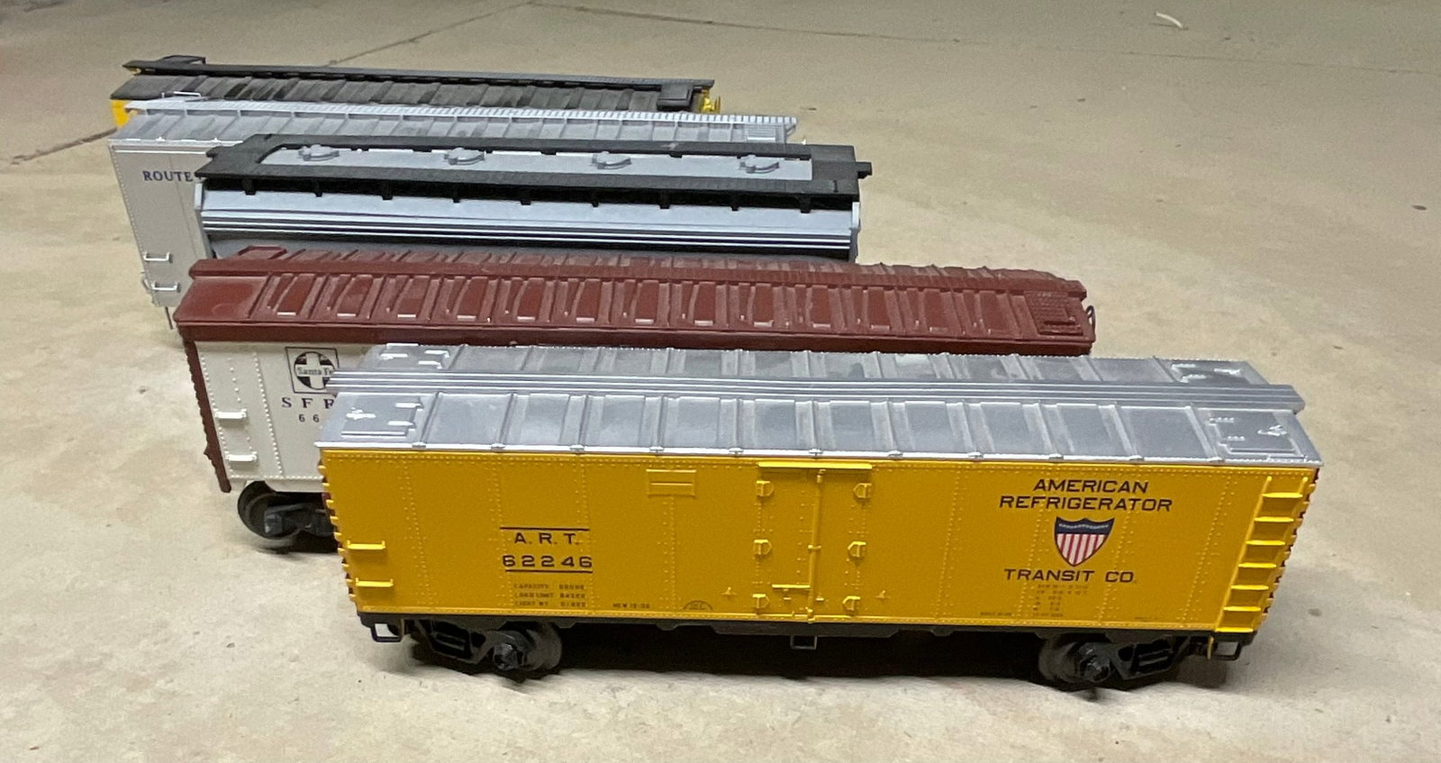 A Collection of Five Lionel and Other O-Gauge Model Railroad Freight Cars (1 of 20)