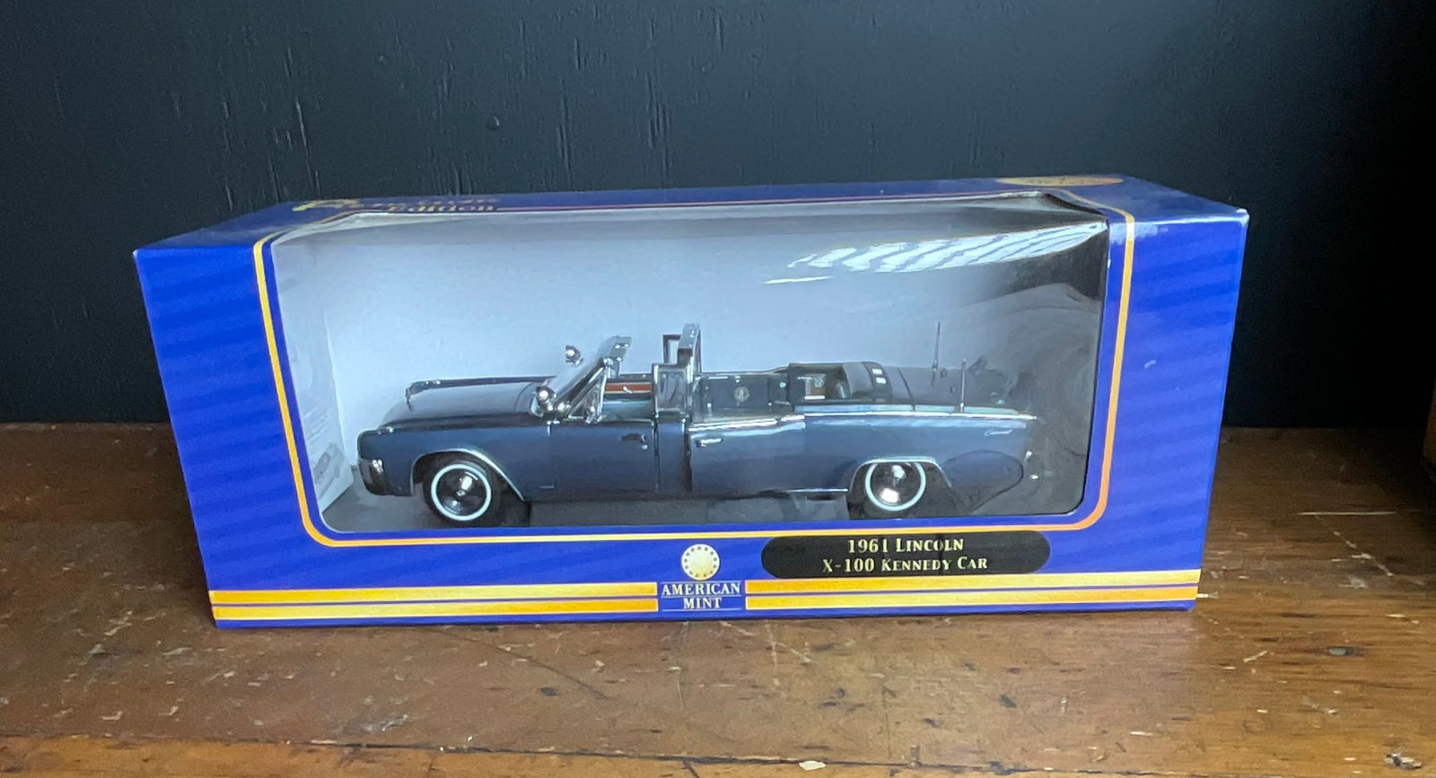 American Mint Premium Edition 1961 Lincoln Continental X-100 Kennedy Car: American Mint Premium Edition 1961 Lincoln Continental X-100 Kennedy Car. This model car is a replica of the presidential limousine used by John F. Kennedy. The vehicle is constructed from die-cast me
