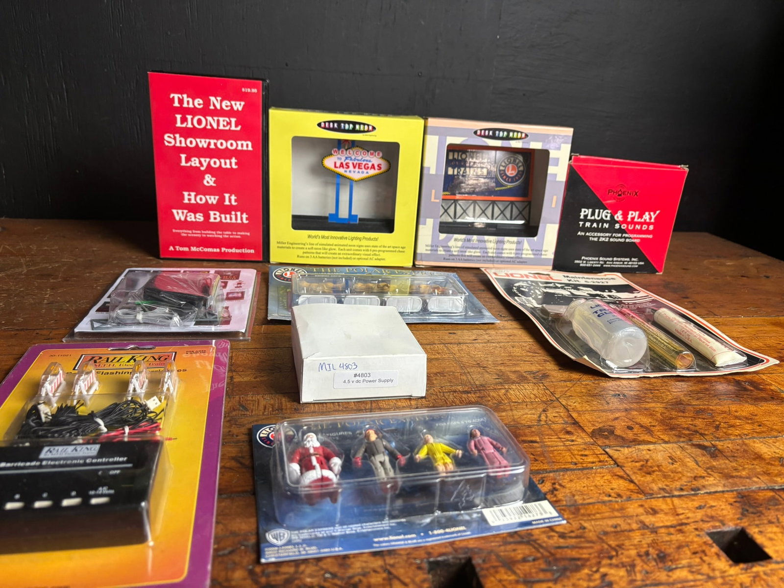 A Collection of Lionel, MTH RailKing, and Miller Engineering Model Train Accessories and Media (1 of 18)