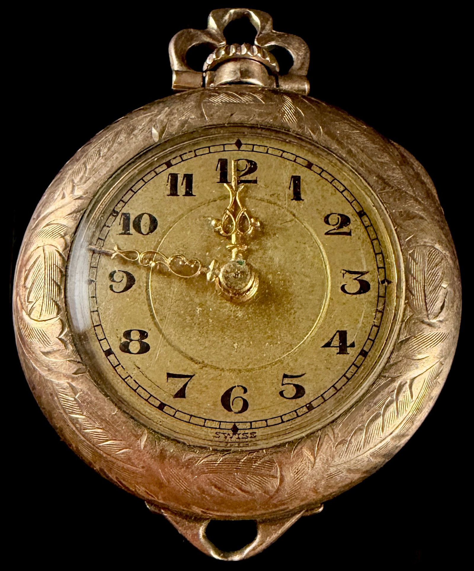 Lotus Watch Co. Swiss 15 Jewel Pendant Pocket Watch in Wadsworth Gold Filled Case: This is a vintage manual-wind pendant pocket watch featuring a Swiss-made movement by the Lotus Watch Co. and a gold-filled case by Wadsworth. The 15-jewel movement is stem-set and includes two adjust