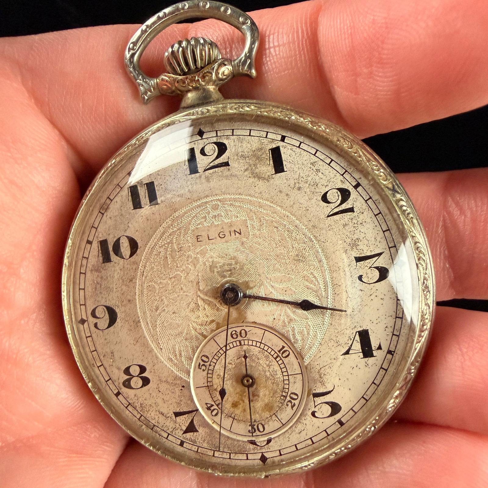 Elgin National Watch Co. 17 Jewel Adjusted 12 Size Open Face Pocket Watch, Does Not Run: An antique American open-face pocket watch manufactured by the Elgin National Watch Co. circa 1925. The size 12 nickel-finish movement is a Grade 387, featuring 17 jewels and adjusted to three positio