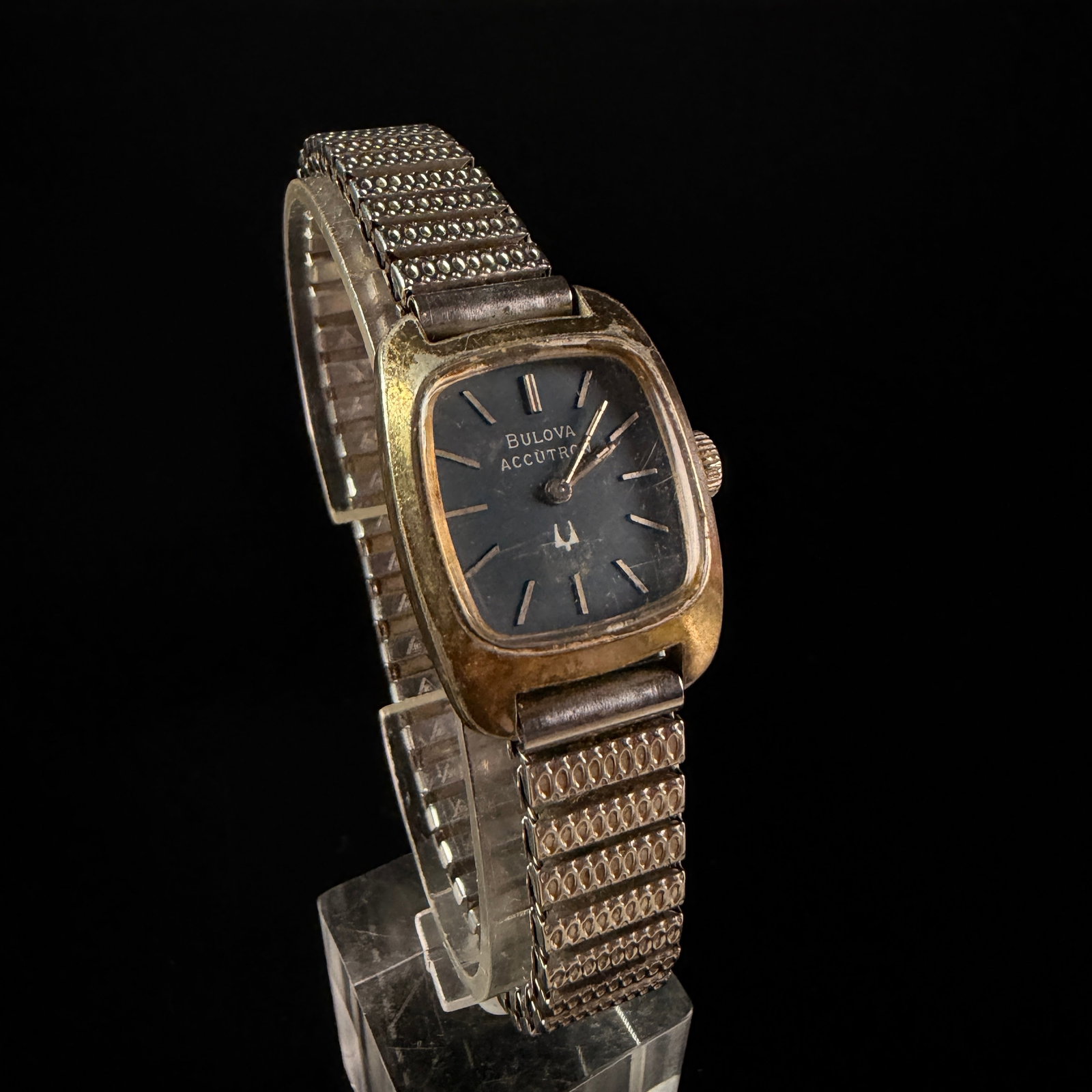 Bulova Accutron Reference 3634 Ladies Gold Tone Tuning Fork Wristwatch: A vintage Bulova Accutron ladies wristwatch, reference 3634, featuring a Bulova caliber 2210 tuning fork electronic movement. The watch case is constructed with a gold-tone base metal bezel and a stai
