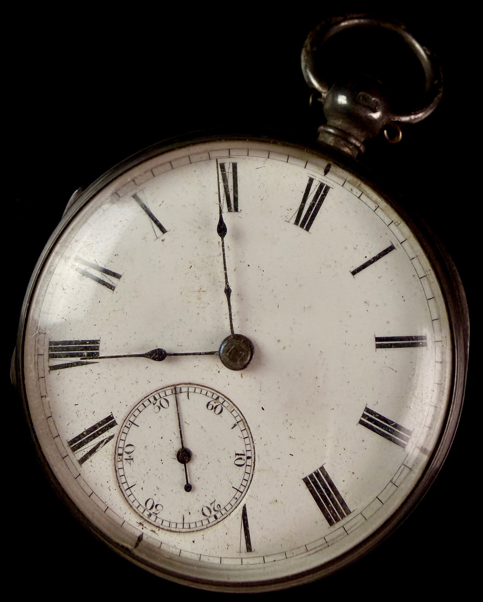 Victorian Sterling Silver Key-Wind Open-Face Pocket Watch Birmingham 1894: This antique open-face pocket watch features a sterling silver case with a white enamel dial. The dial is designed with black Roman numeral hour markers, an outer minute track, and a subsidiary second