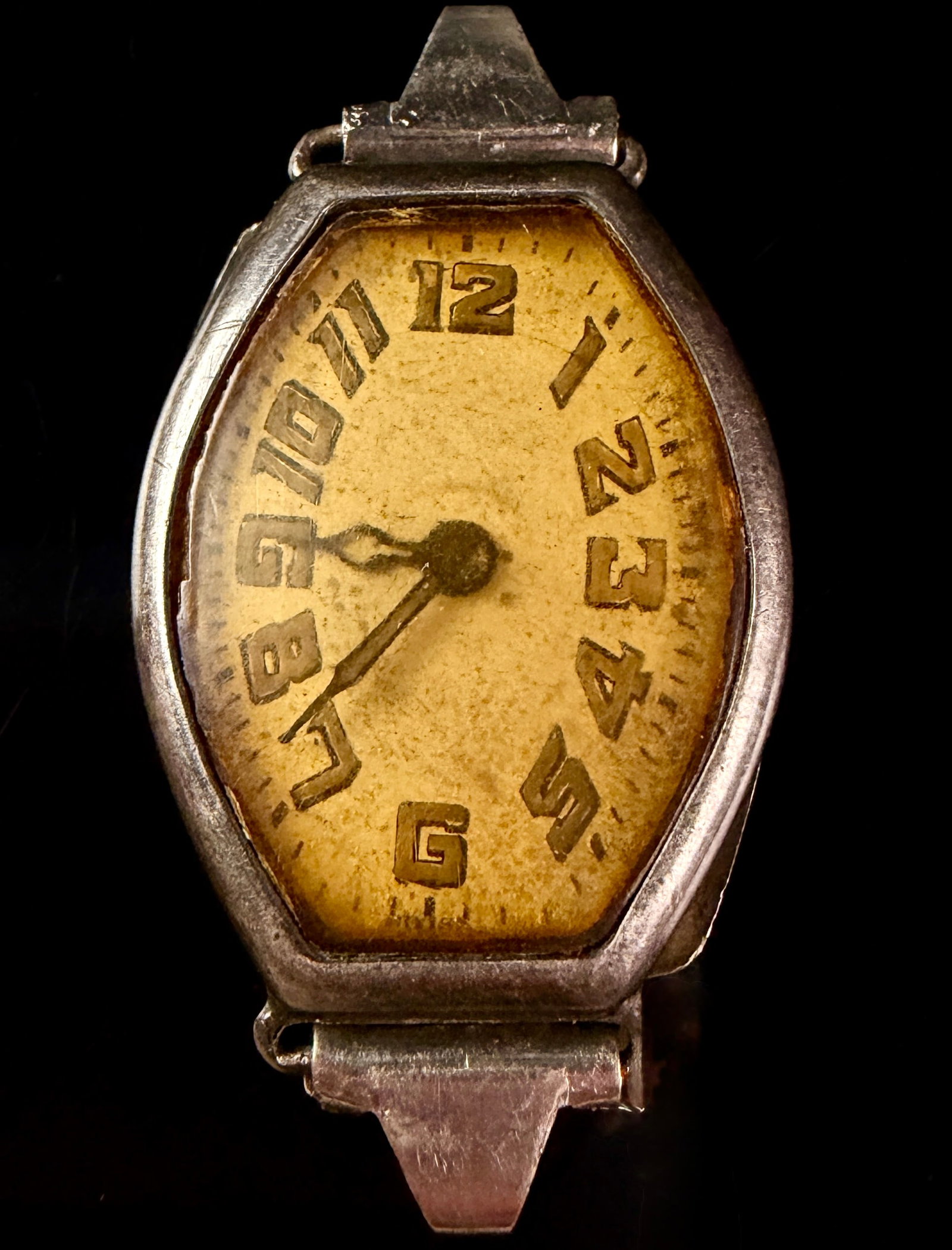 Paul Vermot Art Deco Sterling Silver Tonneau Form Ladies Wristwatch: This Art Deco period ladies wristwatch features a tonneau-form case crafted from .935 purity sterling silver. The manual wind mechanical movement is signed by Swiss maker Paul Vermot and contains 15 j