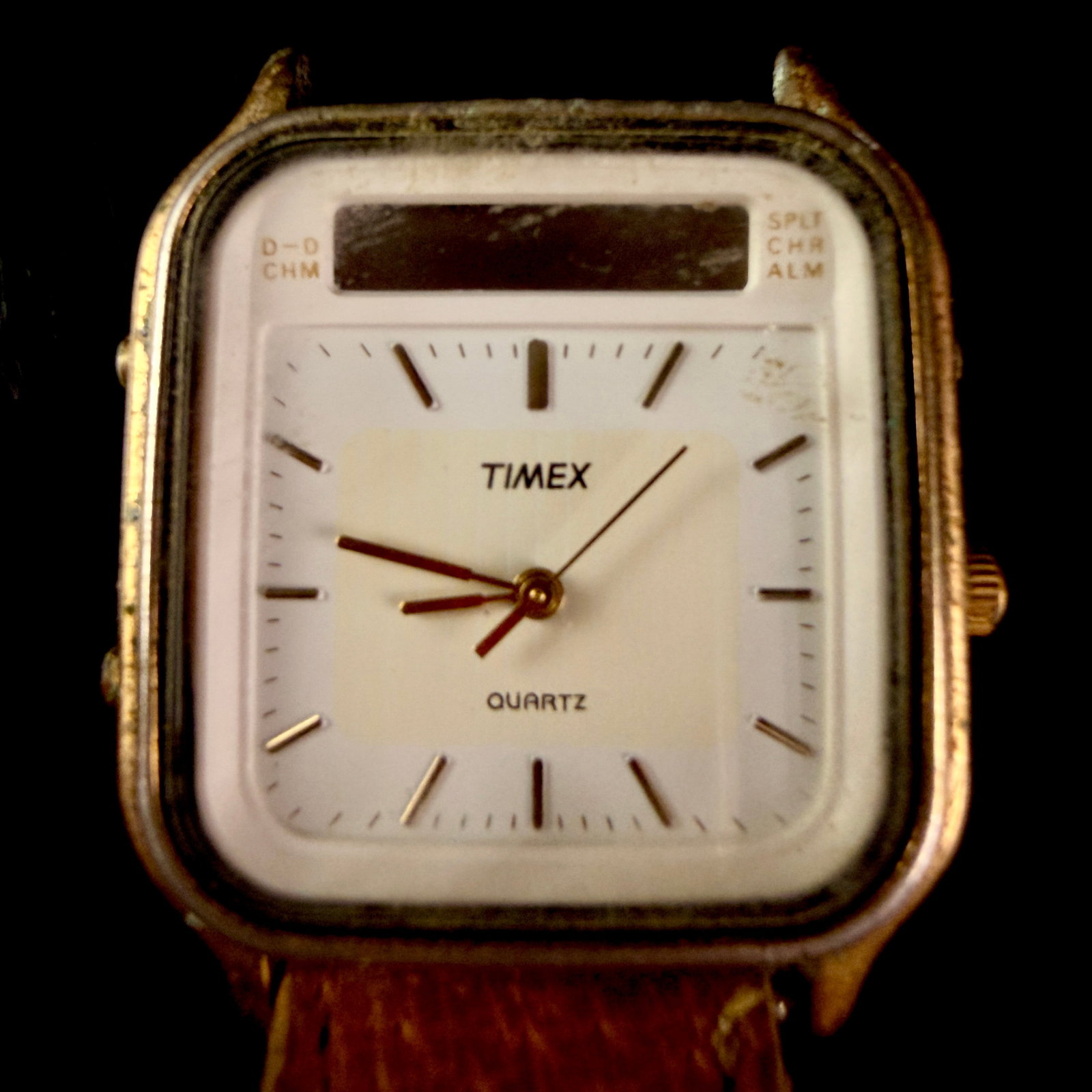 Timex Analog-Digital Quartz Wristwatch Reference 392 K Cell: A vintage Timex analog-digital quartz wristwatch, reference 392 K Cell. The timepiece features a rectangular gold-tone base metal bezel paired with a stainless steel case back. The white dial is