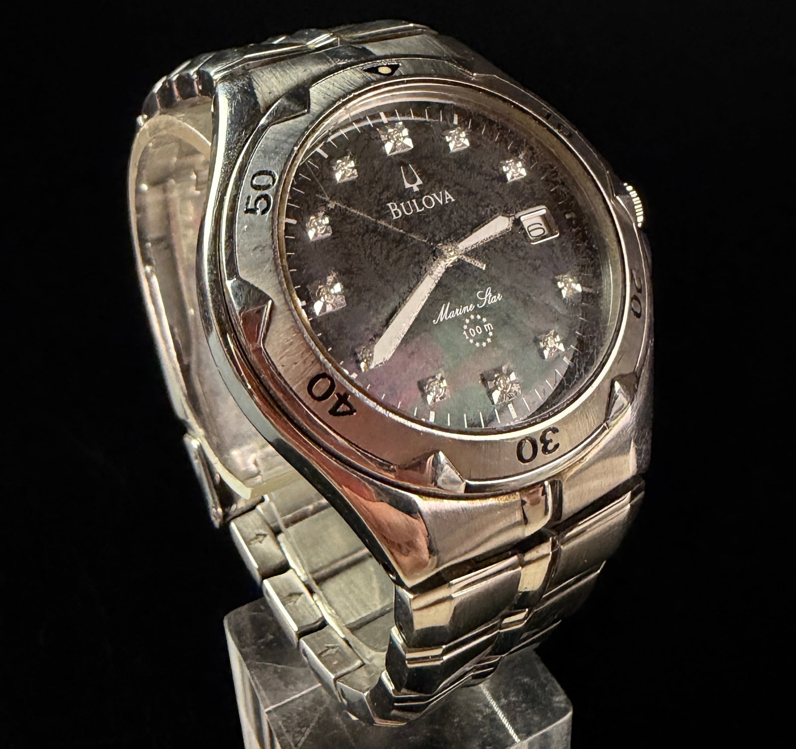Bulova Marine Star Stainless Steel Diamond Accent Wristwatch C837315: A Bulova Marine Star wristwatch, reference C837315, manufactured in 2004 as indicated by the A4 date code on the case back. The timepiece features a stainless steel case and an integrated stainless