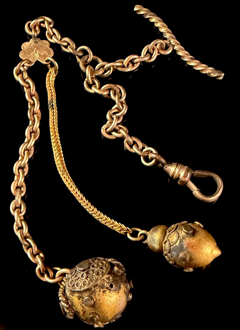 Victorian Gold Filled Albertina Pocket Watch Fob: This Victorian gold filled Albertina pocket watch fob features a double-strand construction consisting of a cable link chain and a fine woven wheat-link chain. The strands are joined by a small, decor