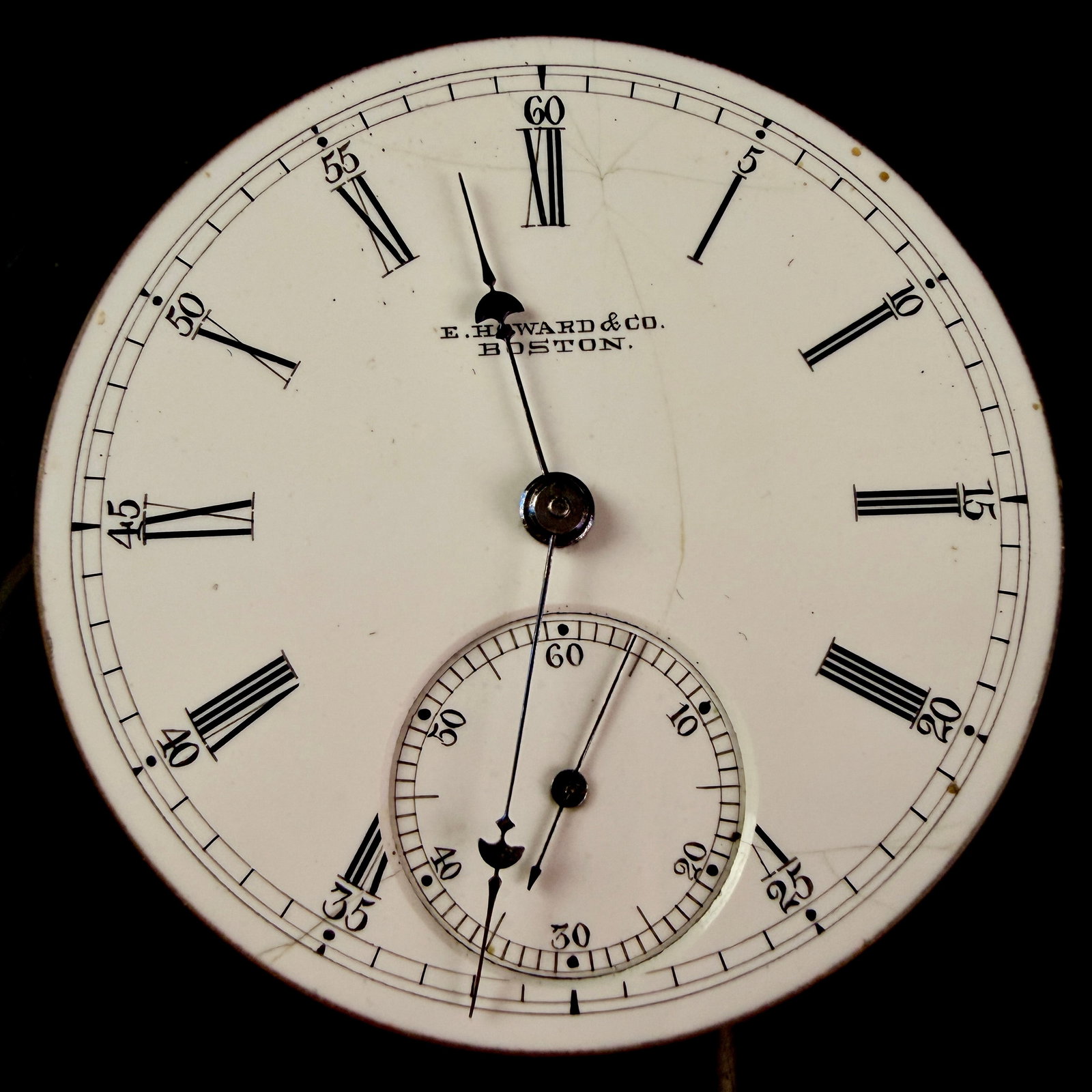 E. Howard and Co. 18-Size Pocket Watch Movement and Dial Serial 60377: This antique pocket watch movement and dial assembly was manufactured by E. Howard and Co. of Boston, Massachusetts. The movement is an 18-size split-plate design, featuring a bi-metallic