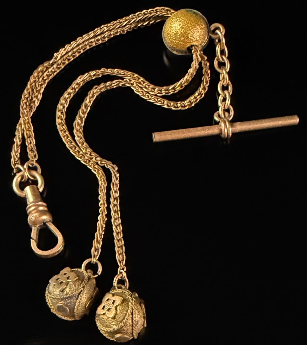 Victorian Gold Filled Double Strand Slide Pocket Watch Chain with Bauble Fobs: A Victorian-era gold filled pocket watch chain featuring a double-strand foxtail link construction. The piece includes a sliding hemispherical bead with a granulated texture that allows for adjustment