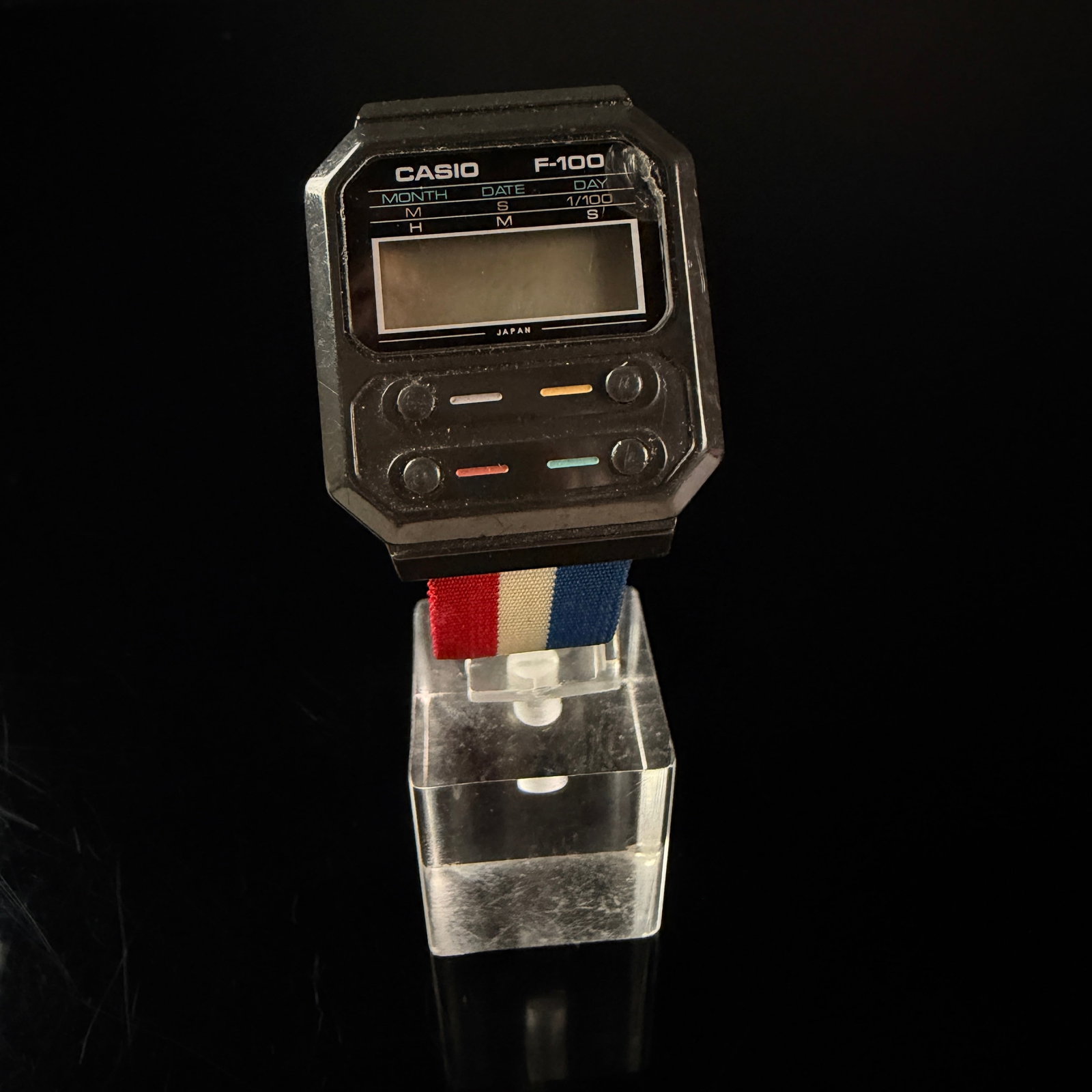 Vintage Casio F-100 Digital Quartz Watch Module 52 Japan R Black Resin Case: A vintage Casio F-100 digital quartz watch, module 52, featuring its original black resin case. Released in 1978, the F-100 was the first Casio model to utilize a full resin case construction and is w