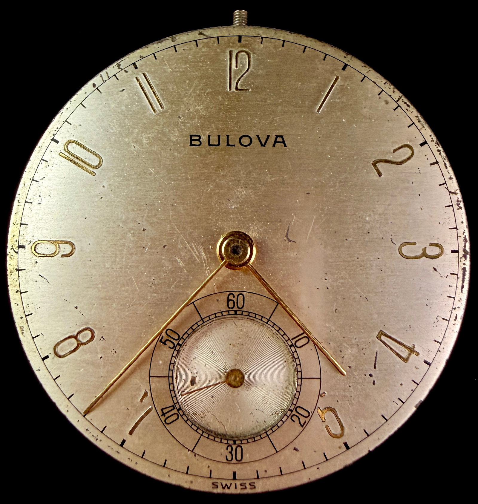 Bulova Caliber 17AH Seventeen Jewel Pocket Watch Movement and Dial: This lot features a mid-20th-century Bulova pocket watch movement and dial assembly. The silver-tone dial is finished with a vertical brush pattern and features applied gold-tone Arabic numerals at th