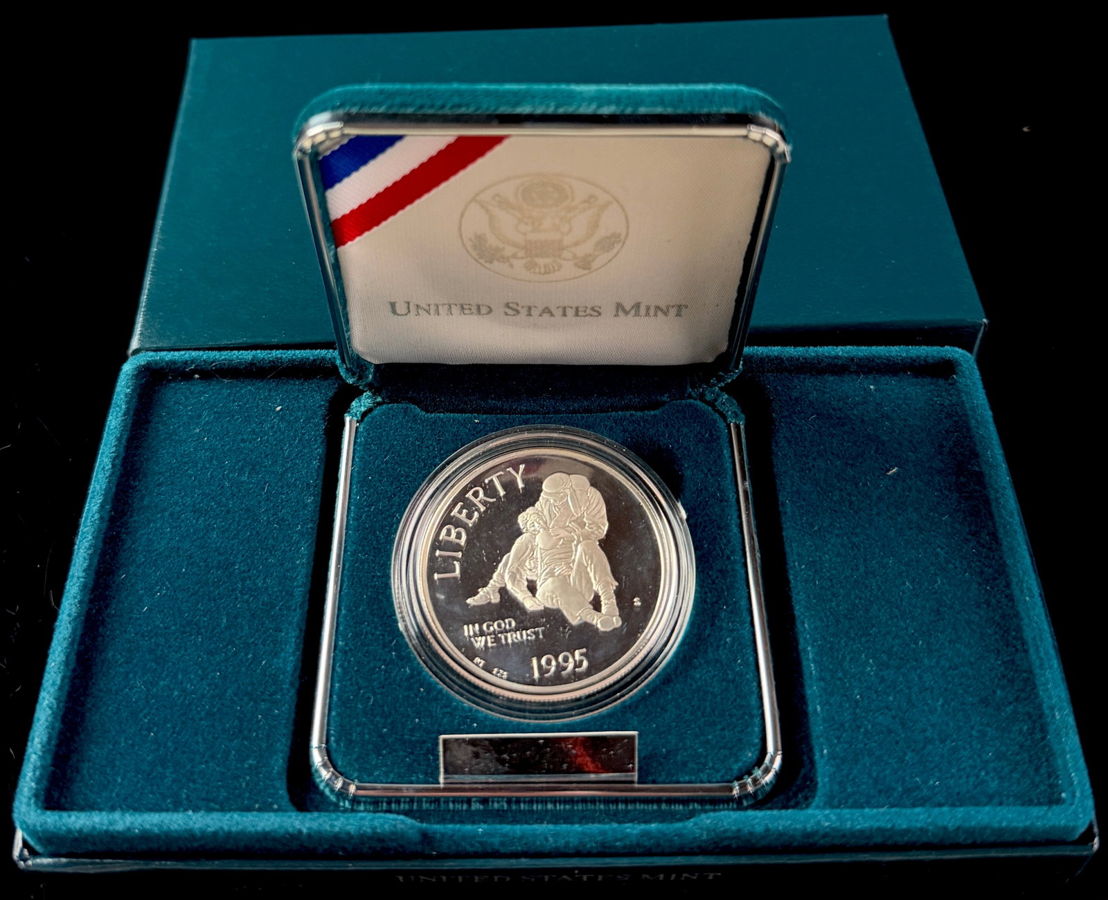 1995-S US Civil War Battlefields Commemorative Proof Silver Dollar: A 1995-S US Civil War Battlefields commemorative silver dollar struck in a proof finish. The coin is composed of 90 percent silver and 10 percent copper. The obverse features an image of a Civil War