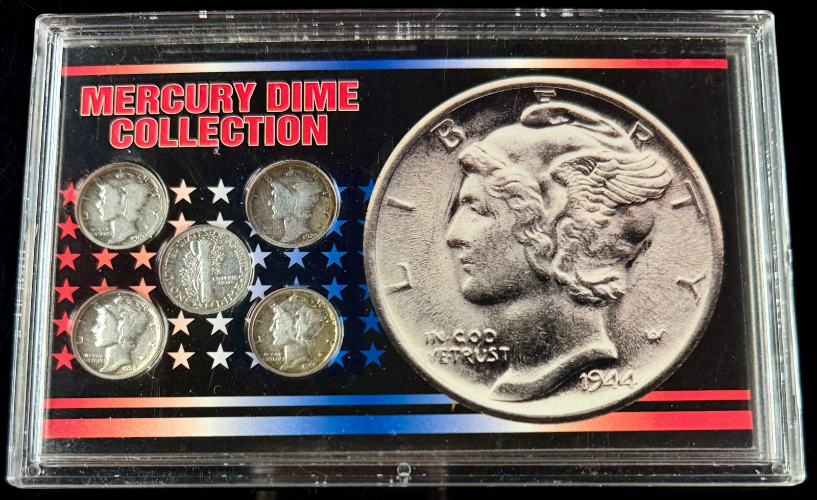 A Group of Five US Mercury Dimes in a 1995 SSCA Presentation Case: A group of five US one dime coins, known as Mercury or Winged Liberty Head dimes, presented in a commemorative plastic case. The coins are composed of 90% silver and feature the Winged Liberty Head