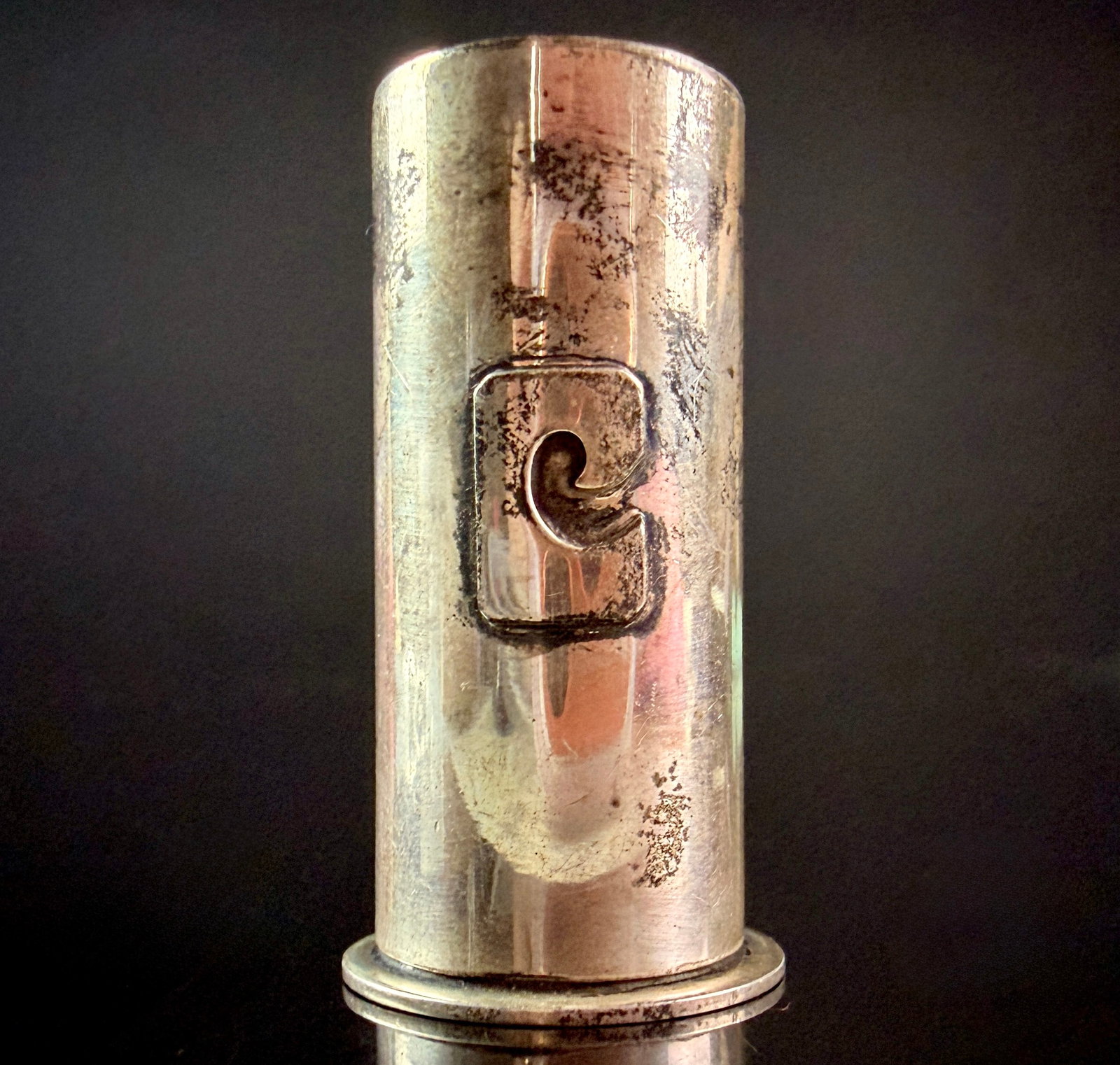 Leonore Doskow Handmade Sterling Silver Modernist Salt or Pepper Shaker: A Leonore Doskow handmade sterling silver individual salt or pepper shaker featuring a minimalist cylindrical form. The two-piece construction consists of a main body with an integrated perforated top