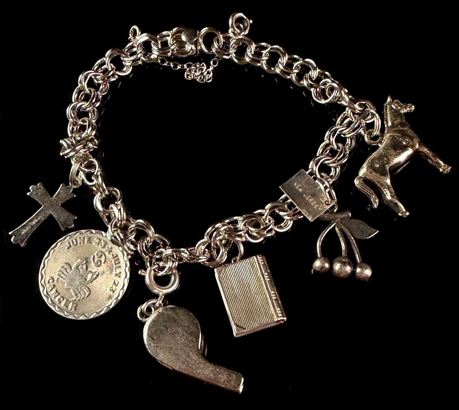 A Sterling Silver Double-Link Charm Bracelet with Multiple Charms (1 of 13)