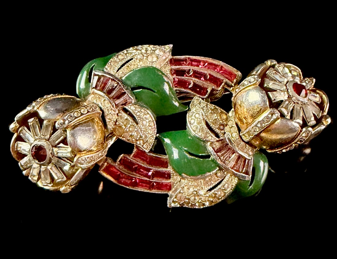 A Coro Craft Duette Quivering Camellia Enameled and Rhinestone Combination Brooch: A vintage costume jewelry assembly consisting of two matching floral-motif dress clips and a separate metal pin frame that allows them to be worn together as a single brooch. The design, known as the 