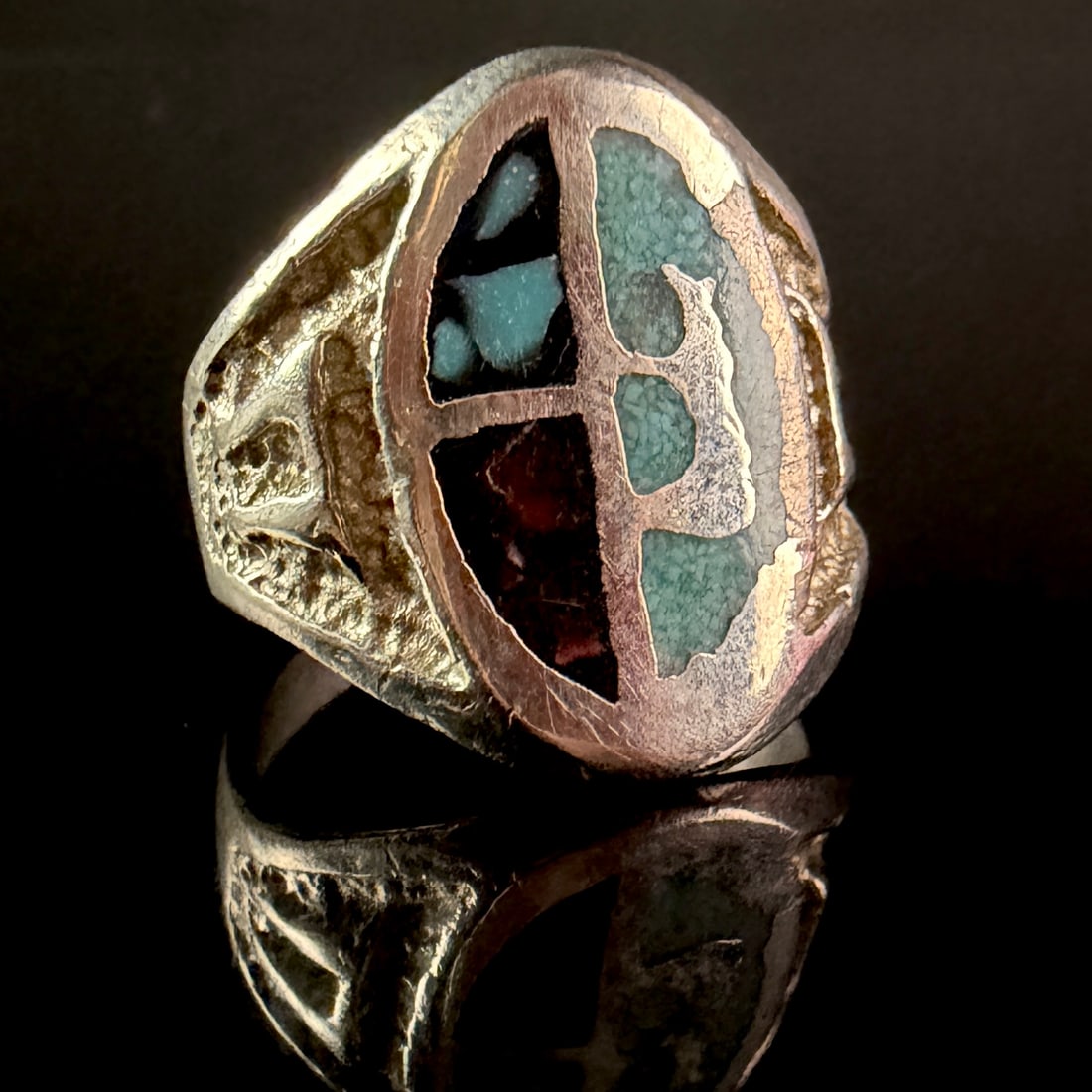 Southwestern Style Sterling Silver Multi-Stone Chip Inlay Signet Ring: A large silver-tone signet-style ring featuring a decorative face with multi-stone chip inlay. The vertical oval face is divided by metal bands into three distinct sections. The right segment is fille