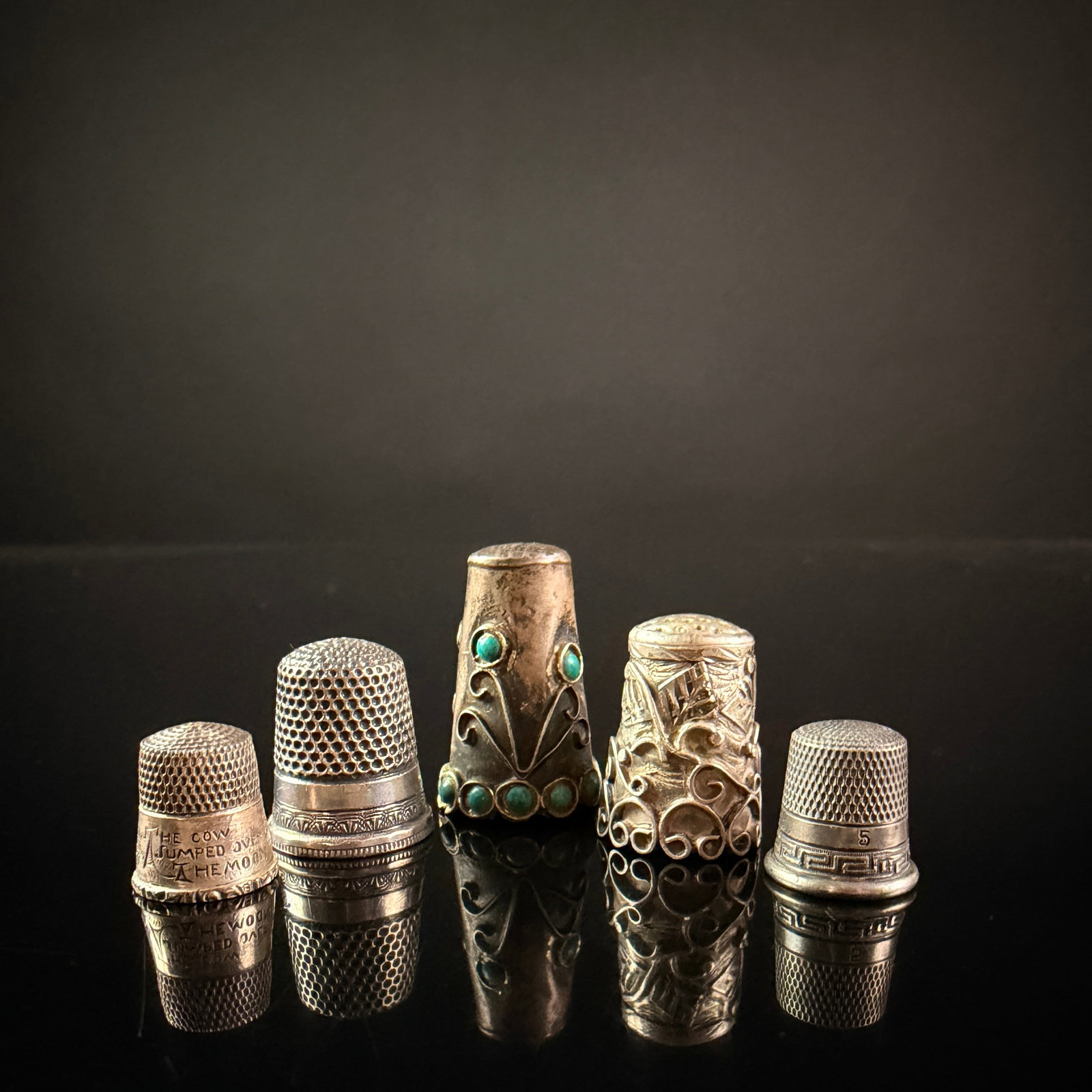 A Collection of Five Sterling Silver Thimbles including a Simons Bros. Nursery Rhyme Example (1 of 15)