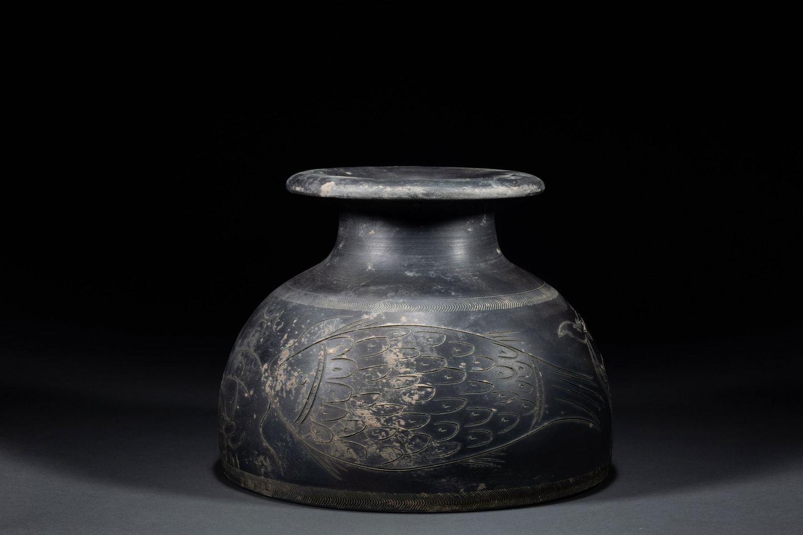 Han Dynasty Black Pottery Pot With Deer Pattern. Auction