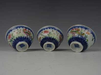 Three porcelain cups: Chinese porcelain Famille rose cups with birds/flowers. Qianlong mark - 18/19th century (probably Qianlong period 1736-1795). Height: 4cm. Diameter 7 cm. All in good condition. No chips, hairline or r