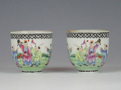A pair porcelain cups: A pair of Chinese porcelain Famille rose cups with boys - Qianlong mark. Ca 1940. Height 6 cm, Diameter 6 cm. In good condition. No chips, hairline or restoration.