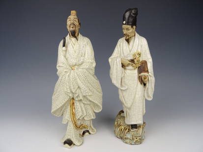 Two yixing statues: Chinese Yixing/porcelain statues of figures. Height 34 cm. In good condition.