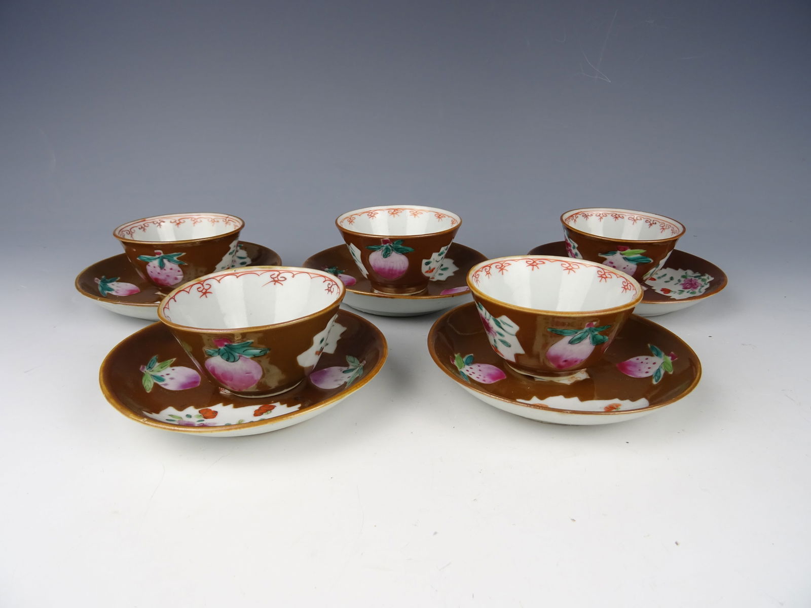 Set of five cups and saucers (1 of 3)