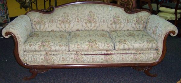 Early Claw Foot Duncan Phyfe Style Sofa: Early claw foot Duncan Phyfe style sofa with goose carved back. Approx. 80" wide x 33" height.