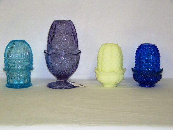 4 Early Colored Glass Fairy Lamps: 2 stamped Fenton custard one & purple colored one, other blue hobnail & light blue one tallest = 7 1/8" tall