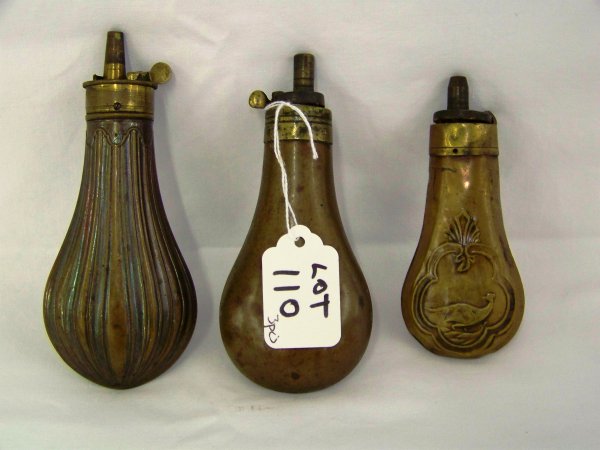 3 Antique Powder Flasks: 1 with bird on both sides that is app 4" long, 1 app.5 3/8" long with design all around last one app. 5" long