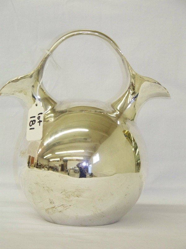 Signed Tane Orfebres Modern Deco Sterling Teapot: With double spouts and handle stands 8 5/8" tall 7 1/2" wide. Weight 29.3ozs. Stamped on base Tane MT01 Mex 925