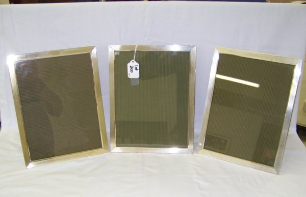 3 Christofle Silver Picture Frames: All 10 5/8" tall 8 1/4" wide, all stamped Sofard, 2 are silver in color other gold washed in color