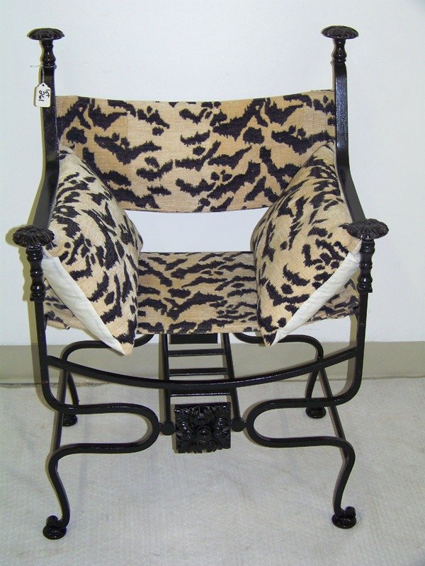 Early Iron Miziner Style Throne Chair: Stands app 33 1/2" tall 24 1/4" wide,with black & white zebra style upoh.,resting on round feet.