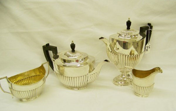 4Pc Early Sheiffield S/P Tea Set: 10" tall tea pot,7" tea pot ang gold washed creamer & gold washed large sugar.With Ebony handles