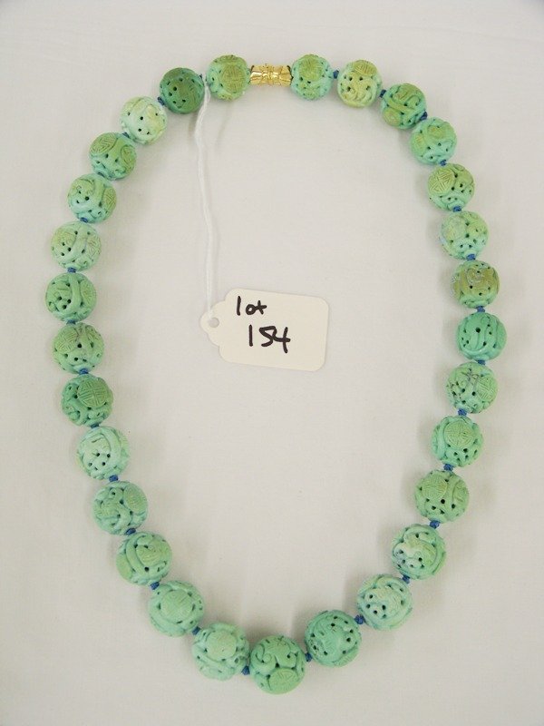 Early Chinese Carved Turquoise & 14kt Necklace: Percied carved round balls with chinese symbols.With nice 14kt clasp. Total length app 22 1/2"