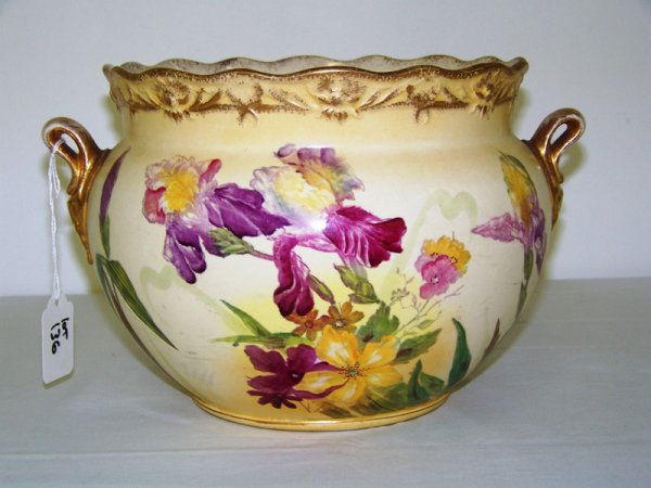 Early Bonn Germany Hand Painted Chamber Pot: With double handles , painted with florals . Stands app. 6 3/4" tall and app. 10 1/4" across top handle top handle
