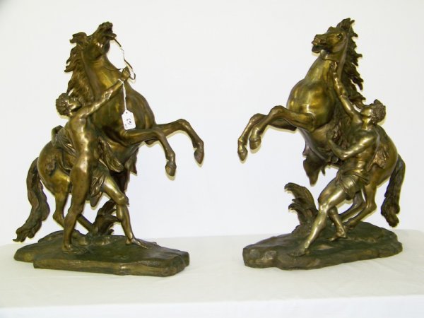 Pair Patinated Bronze Group of Marly Horses: 20th C. pair of patinated bronze figure group of Marley Horses . One 24" tall other 23 1/2" tall , both over 20" wide.