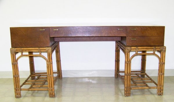 Mid C. Modern Bamboo Leather Wrapped Desk: With a type of burlwood desk top , with 4 drawers rattan base .60" long 30" wide 29" tall. Made by Henredon.