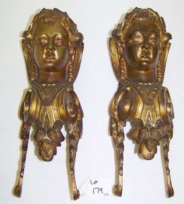 Pair 19th C.French Figural Female Furniture Mounts: Pair of great figural mounts. Finely Detailed with scrolling hair and accorns, both numbered on backs and looks to maybe signed ? Both are app. 11" tall 4" wide and app. 4" deep.