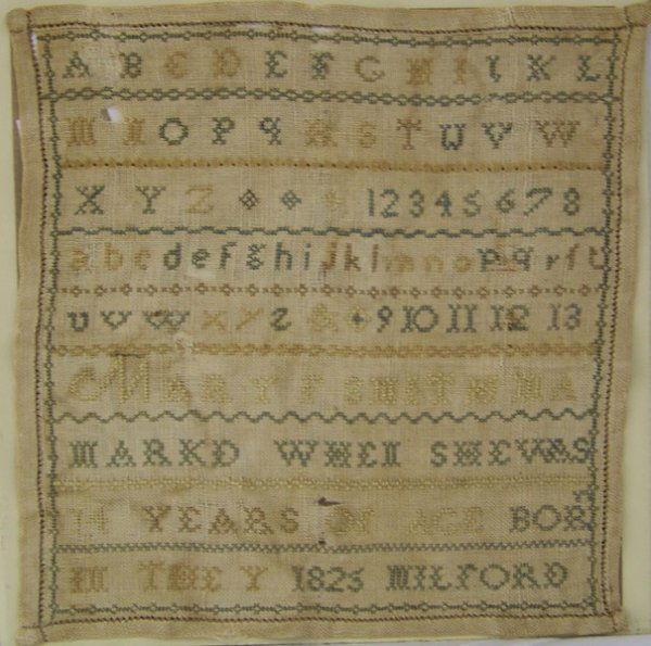 Antique 1825 Sampler Mary Smith Milford: Early sampler which states that it was made when she was 14 years old in the year of 1825 Milford MA , numbered up to the number 13 , app. 9 1/4" wide and app. 9 1/2" tall.
