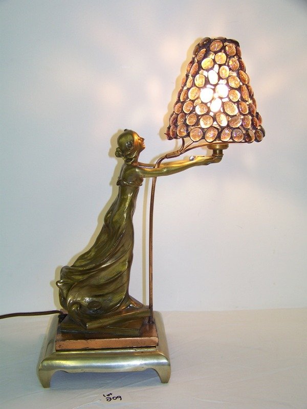Deco Figural Desk Lamp W/ Lead Glass Grape Shade: Great lamp with large lead glass grape cluster shade.Resting on brass base,of female standing on books. Stands app. 16 1/2" tall, figure is app. 10 1/2" tall.