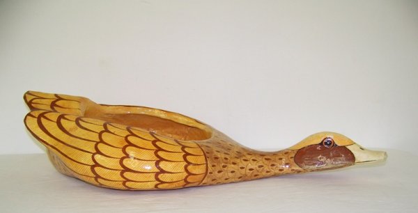 Sergio Bustamante 24/100 Signed Lg. Duck Bowl: Looks to be a large duck or goose with the center opened up to hole a bowl or maybe a planter. 25" long and app. 12" wide.