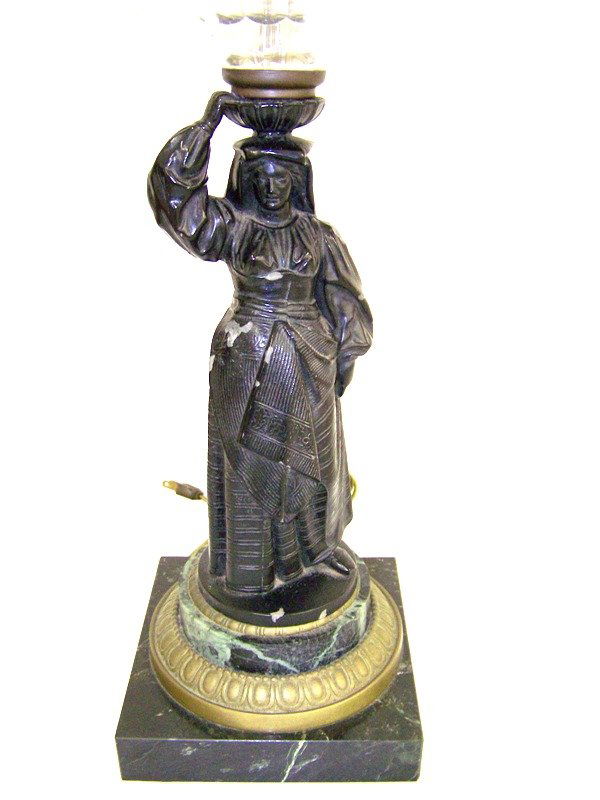 Early Figural Oil Lamp " Harrods Messengers Stor: Great old oil lamp now converted , with marble base and figural support and large cut crystal oil holder. Stamped on wick riser " Harrods Messengers Store "25" tall. Figure is made out of what looks t