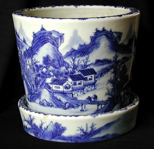 Old Chinese Porcelain Blue and White Planter: This old Chinese blue and white porcelain planter with under plate is 7 1/4" high and 8" diameter. It has a landscape design and is Signed