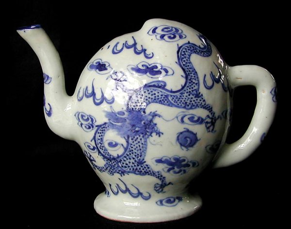 Old Chinese Blue and White Porcelain Puzzle Pot: This is an old Chinese blue and white porcelain puzzle pot with dragon decoration. It is 5" high and 6" wide and it is Signed. No chips, cracks or repairs